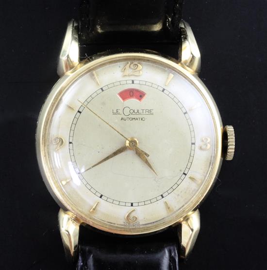 A gentlemans 1950s? 14ct gold Jaeger Le Coultre automatic wrist watch with power reserve indicator,